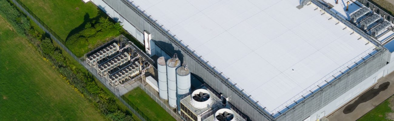 data center, cloud services, industrial scale, processing storage adn data infrastructure. Aerial view.